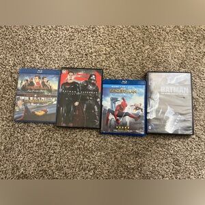Blu-ray/ dvd movie bundle featuring Batman and Spiderman